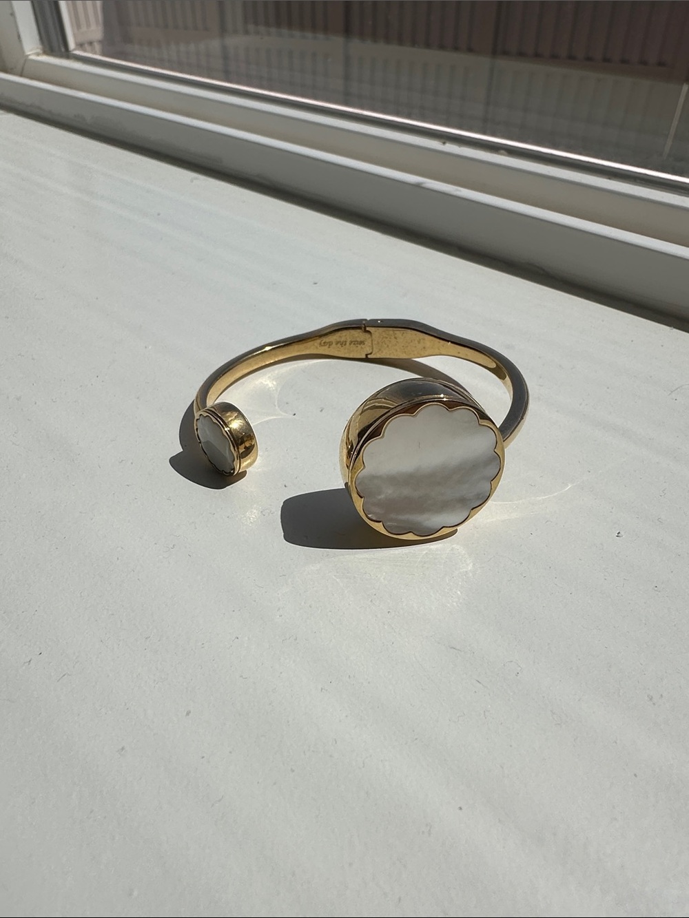 Kate Spade Step Counter Bracelet and White Mother-of-Pearl Cuff Bracelet